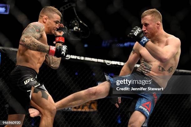 Justin Gaethje kicks Dustin Poirier in their lightweight fight during the UFC Fight Night event at Gila River Arena on April 14, 2018 in Glendale,...