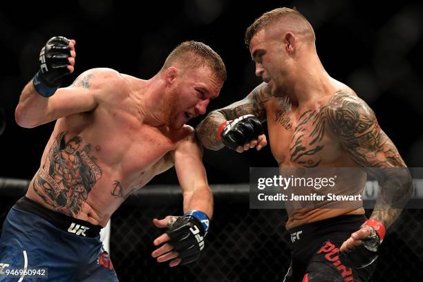 Dustin Poirier throws an elbow at Justin Gaethje in their lightweight fight during the UFC Fight Night event at Gila River Arena on April 14, 2018 in...