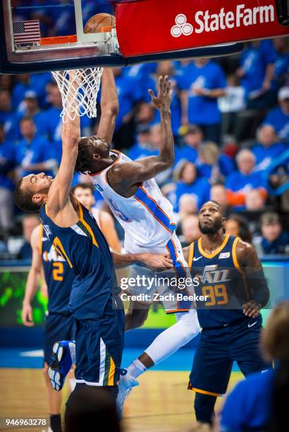 Jerami Grant of the Oklahoma City Thunder drives to the basket against the Utah Jazz during Game one and Round one of the 2018 NBA Playoffs on April...