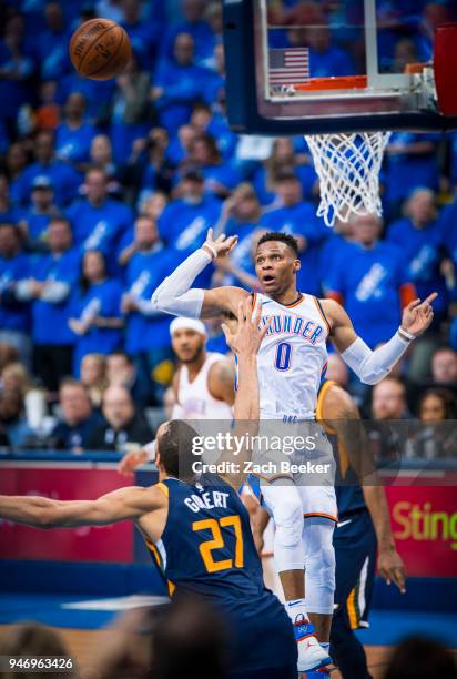 Russell Westbrook of the Oklahoma City Thunder passes the ball against the Utah Jazz during Game one and Round one of the 2018 NBA Playoffs on April...