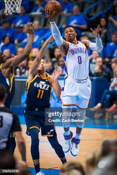 Russell Westbrook of the Oklahoma City Thunder drives to the basket against the Utah Jazz during Game one and Round one of the 2018 NBA Playoffs on...