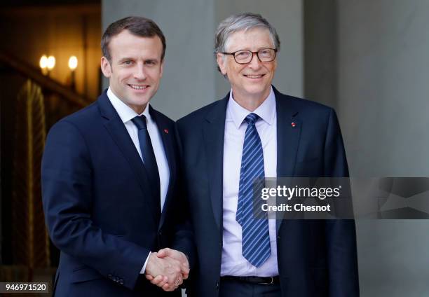 French president Emmanuel Macron accompanies Co-chairman and co-founder of the The Bill and Melinda Gates Foundation, Bill Gates after their meeting...