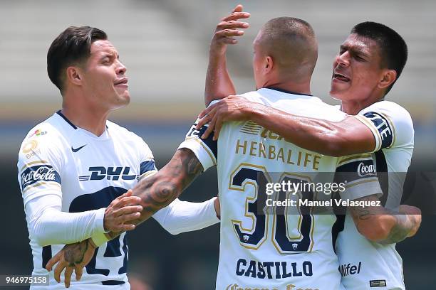 Nicolas Castillo of Pumas celebrates with teammates Jesus Gallardo and Pablo Barrera after scoring a goal during the 15th round match between Pumas...