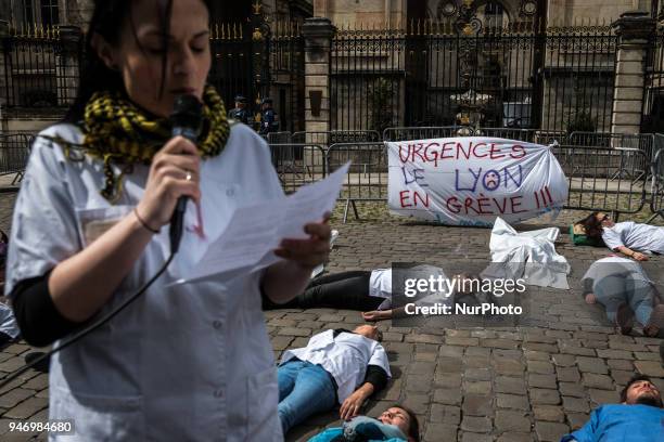 About fifty people, doctors, nurses and caregivers, demonstrated on April 16, 2018 on the Place de la Comedie in Lyon, France. Lying on the ground,...