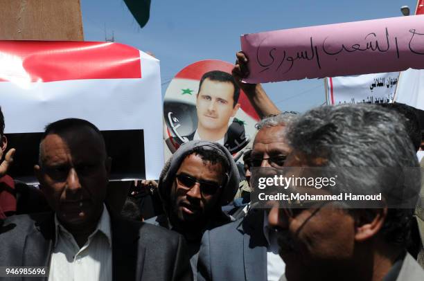 Yemenis protest against U.S. Allied missile strikes against Syria outside the Syrian embassy on April 16, 2018 in Sana'a, Yemen. The U.S., Great...