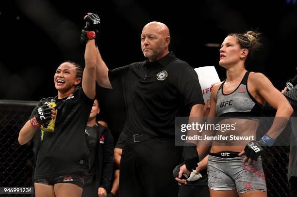 Michelle Waterson celebrates her victory over Cortney Casey in their womens strawweight fight during the UFC Fight Night at Gila River Arena on April...