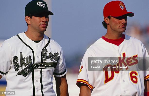 Todd Helton of Colorado Springs Sky Sox and Paul Konerko of Albuquerque Dukes look on during the 1997 Triple A All-Star Game between National League...