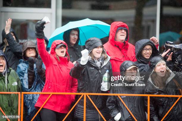 Spectators cheer the elite runners during the 2018 Boston Marathon as they pass on April 16, 2018 in Brookline, Massachusetts. Desiree Linden became...