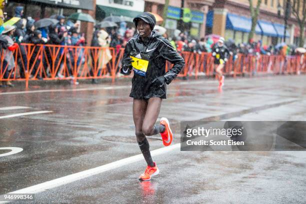 Edna Kiplagat approaches the 24 mile marker of the 2018 Boston Marathon on April 16, 2018 in Brookline, Massachusetts. Desiree Linden became the...