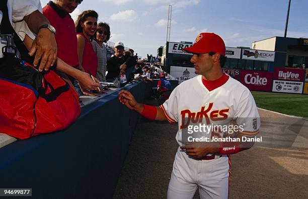 Paul Konerko of Albuquerque Dukes signs autographes after the 1997 Triple A All-Star Game between National League and American League at Taylor...