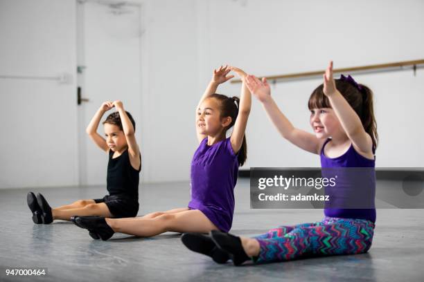 group of children practicing dance at studio - jazz dancing stock pictures, royalty-free photos & images