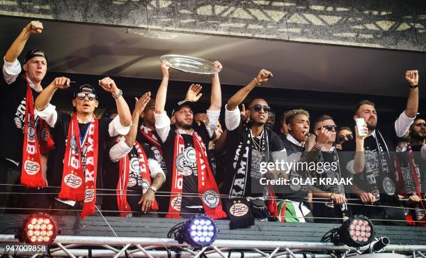Eindhoven's players celebrate a day after winning winning their 24th Dutch Eredivisie title on April 16 in Eindhoven. / AFP PHOTO / ANP / Olaf Kraak...