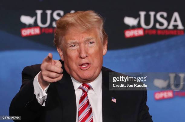 President Donald Trump speaks during a roundtable discussion about the Republican $1.5 trillion tax cut package he recently signed into law on April...