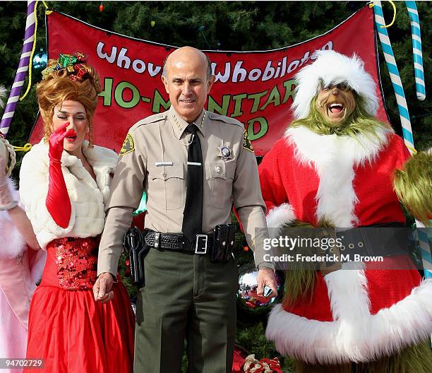 Los Angeles County Sheriff Lee Baca and Universal Studios characters launch the "13 Days of Grinchmas" on December 17, 2009 in Universal City,...