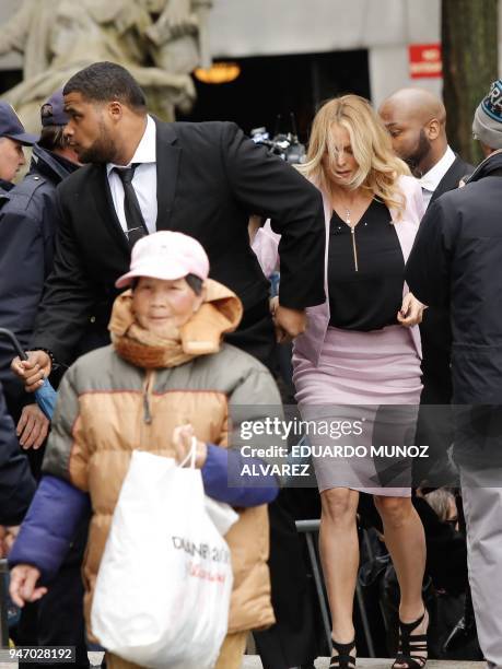 Adult-film actress Stephanie Clifford, also known as Stormy Daniels arrives for a court hearing at the US Courthouse in New York on April 16, 2018....