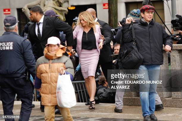 Adult-film actress Stephanie Clifford also known as Stormy Daniels arrives for a court hearing at the US Courthouse in New York on April 16, 2018....