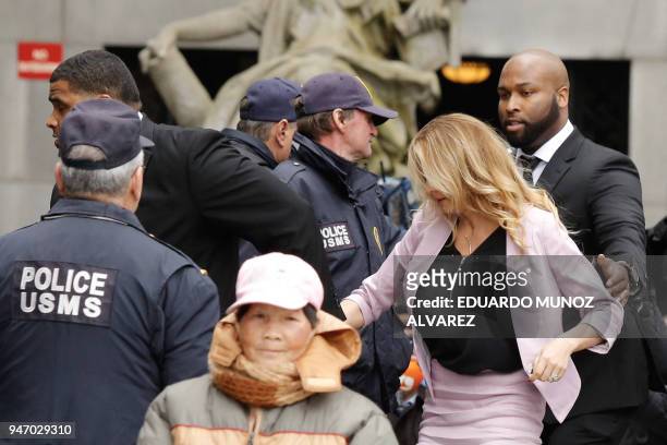 Adult-film actress Stephanie Clifford also known as Stormy Daniels arrives for a court hearing at the US Courthouse in New York on April 16, 2018....