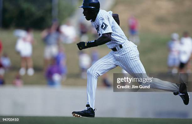 Michael Jordan of the Birmingham Barons runs the bases during an August 1994 game against the Memphis Chicks at Hoover Metropolitan Stadium in...