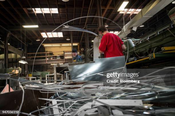Workers stack cut metal at the Metal Manufacturing Co. Facility in Sacramento, California, U.S., on Thursday, April 12, 2018. The Federal Reserve is...