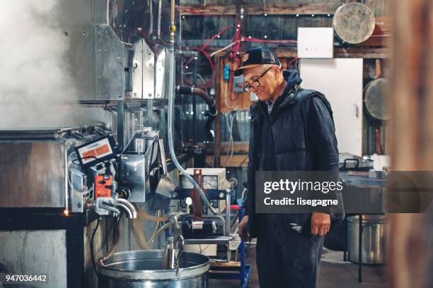 small family business of a maple syrup industry - maple syrup stock pictures, royalty-free photos & images