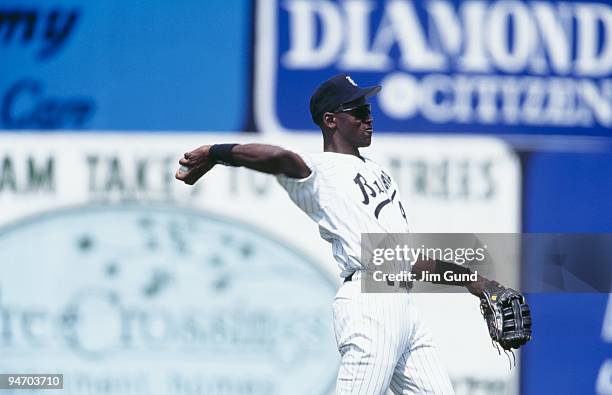 Michael Jordan of the Birmingham Barons throws during an August 1994 game against the Memphis Chicks at Hoover Metropolitan Stadium in Hoover,...