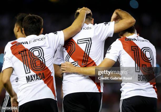 Lucas Pratto of River Plate celebrates with teammates Rafael Santos Borre and Camilo Mayada after scoring the second goal of his team during a match...