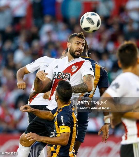 Lucas Pratto of River Plate heads the ball during a match between River Plate and Rosario Central as part of Superliga 2017/18 at Estadio Monumental...