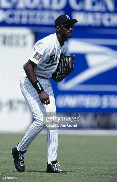 Michael Jordan of the Birmingham Barons plays in the field during an August 1994 game against the Memphis Chicks at Hoover Metropolitan Stadium in...