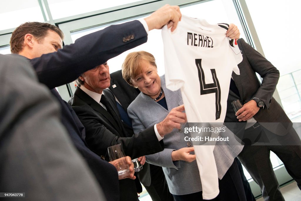 German Chancellor Merkel Receives Football Delegation