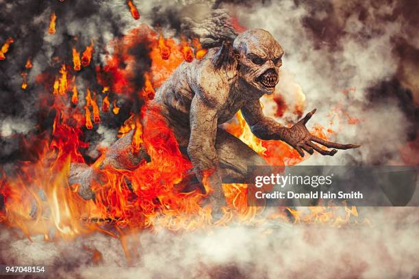 fallen angel: evil demon snarling with smoke, fire and brimstone all around - schwefel stock-fotos und bilder