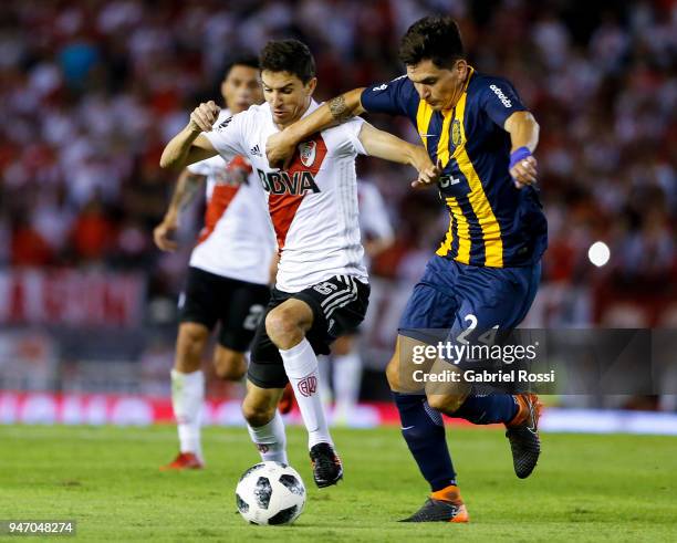 Ignacio Fernandez of River Plate fights for the ball with Alfonso Parot Rojas of Rosario Central during a match between River Plate and Rosario...