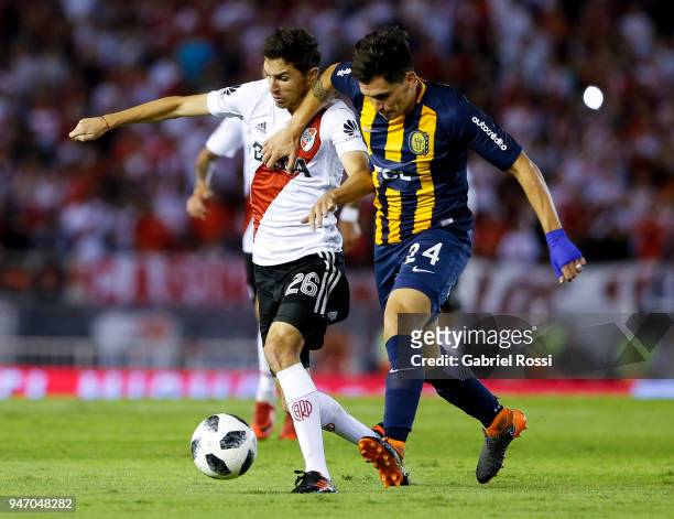 Ignacio Fernandez of River Plate fights for the ball with Alfonso Parot Rojas of Rosario Central during a match between River Plate and Rosario...