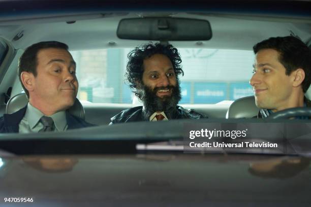 Gray Star Mutual" Episode 517 -- Pictured: Joe Lo Truglio as Charles Boyle, Jason Mantzoukas as Adrian Pimento, Andy Samberg as Jake Peralta --