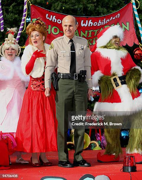 Los Angeles County Sheriff Lee Baca and Universal Studios characters launch the "13 Days of Grinchmas" on December 17, 2009 in Universal City,...