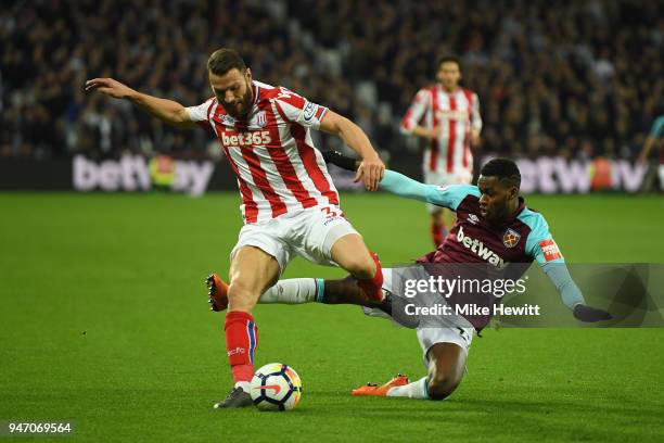 Erik Pieters of Stoke City and Edimilson Fernandes of West Ham United battle for possession during the Premier League match between West Ham United...