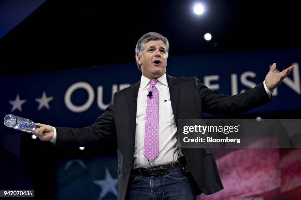 Sean Hannity, host of the Sean Hannity Show, gestures while arriving to interview Reince Priebus, chairman of the Republican National Committee, not...