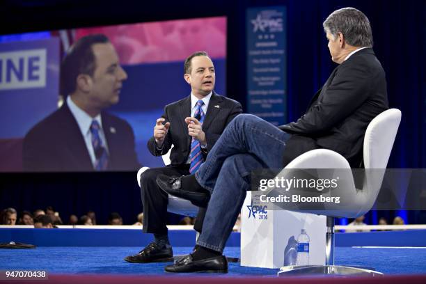 Reince Priebus, chairman of the Republican National Committee , left, speaks during an interview with Sean Hannity, host of the Sean Hannity Show, at...