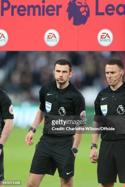Referee Michael Oliver during the Premier League match between West Ham United and Stoke City at London Stadium on April 16, 2018 in London, England.