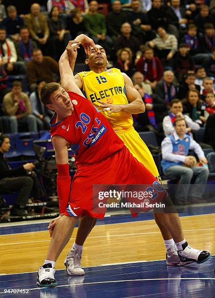 Andrey Vorontsevich, #20 of CSKA Moscow competes with David Bluthenthal, #15 of Maccabi Electra Tel Aviv in action during the Euroleague Basketball...