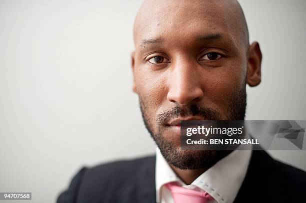 French footballer Nicolas Anelka poses at the Francais Of The Year awards in London on December 17, 2009. The event is held yearly for French...