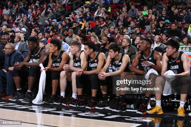 The Team World bench looks on during the game against Team USA during the Nike Hoop Summit on April 13, 2018 at the MODA Center Arena in Portland,...