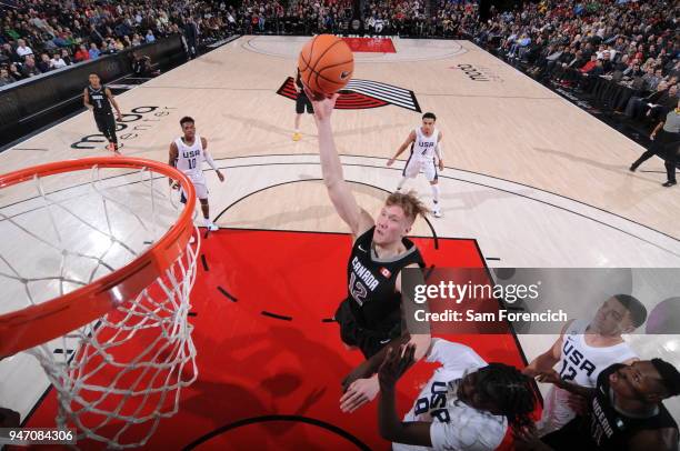 Ignas Brazdeikis of Team World drives to the basket against Team USA during the Nike Hoop Summit on April 13, 2018 at the MODA Center Arena in...