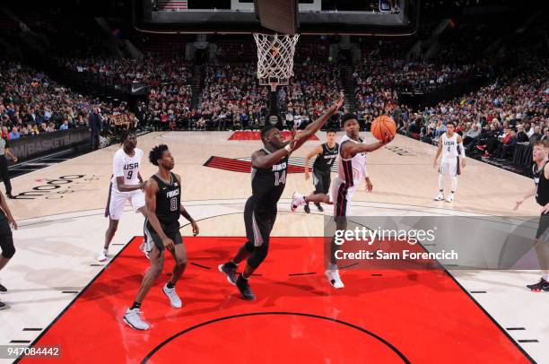 Cameron Reddish of Team USA drives to the basket against Team World during the Nike Hoop Summit on April 13, 2018 at the MODA Center Arena in...