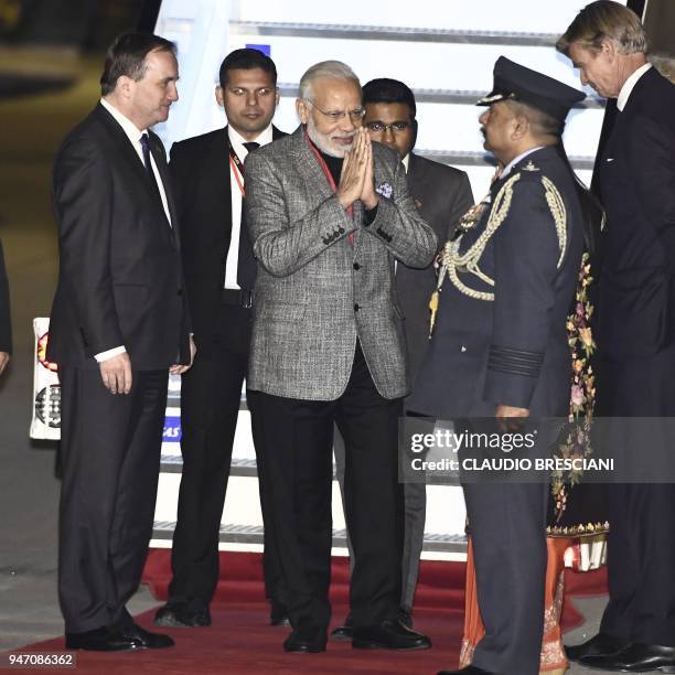 Indias Prime Minister Narendra Modi is greeted by Swedish Prime Minister Stefan Lofven upon his arrival at Arlanda Airport in Stockholm, Sweden, on...