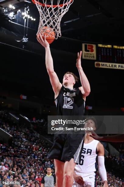 Ignas Brazdeikis of Team World drives to the basket against Team USA during the Nike Hoop Summit on April 13, 2018 at the MODA Center Arena in...