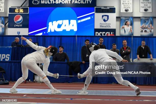 Emma von Dadelszen of Ohio State University and Tatijana Stewart of Princeton University compete in the Epée competition during the Division I...