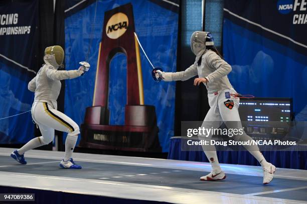Francesca Russo of the University of Notre Dame takes on Maia Chamberlain of Princeton University in the foil competition during the Division I...