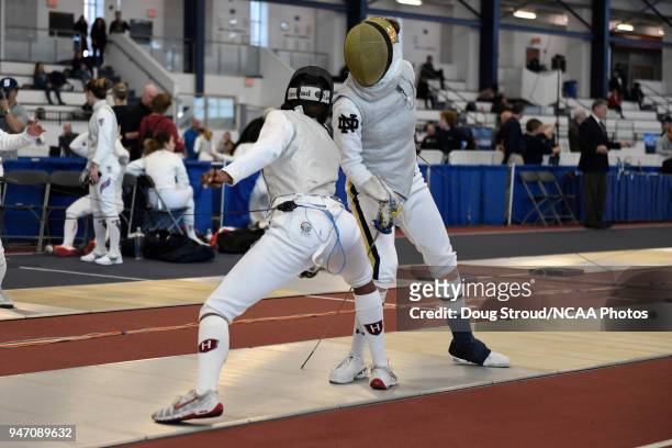 MacKenzie Lawrence of Harvard University and Sabrina Massialas of Notre Dame compete in the foil competition during the Division I Women's Fencing...