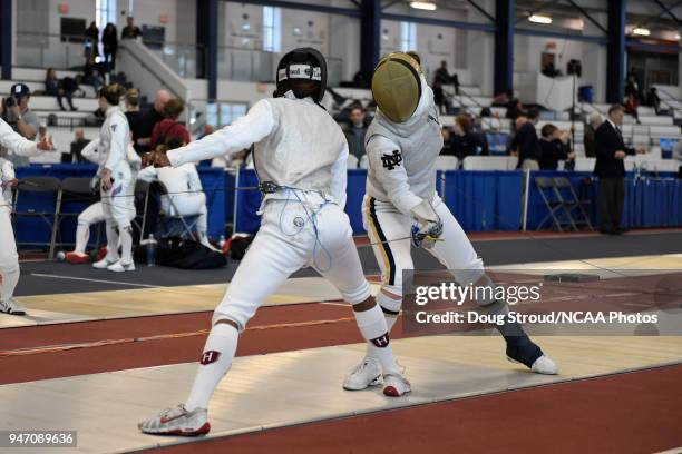 MacKenzie Lawrence of Harvard University and Sabrina Massialas of Notre Dame compete in the foil competition during the Division I Women's Fencing...