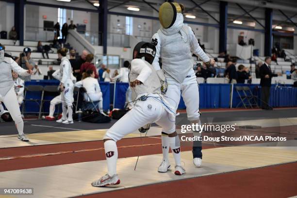 MacKenzie Lawrence of Harvard University and Sabrina Massialas of Notre Dame compete in the foil competition during the Division I Women's Fencing...